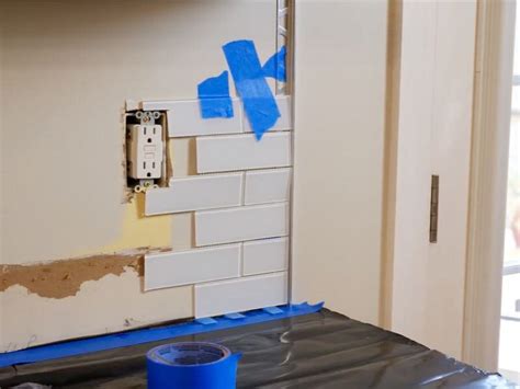 how to place backsplash tile pattern around electrical boxes|electrical outlet backsplash installation.